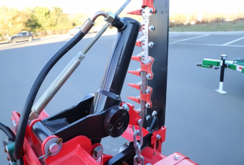 Close-up image of the reciprocating cutting system of the 9GD-2.5 towed single-blade lawnmower.