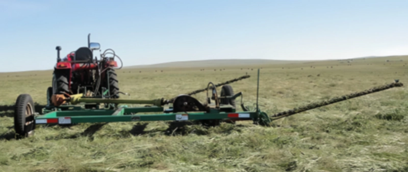 9GS-5.0 Towable Dual-Blade Lawn Mower is being used in the field.